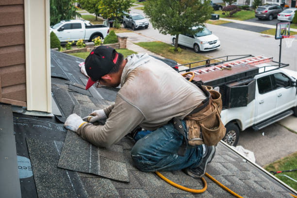 Professional Storm Damage Roof Repair technician working in Boston, MA